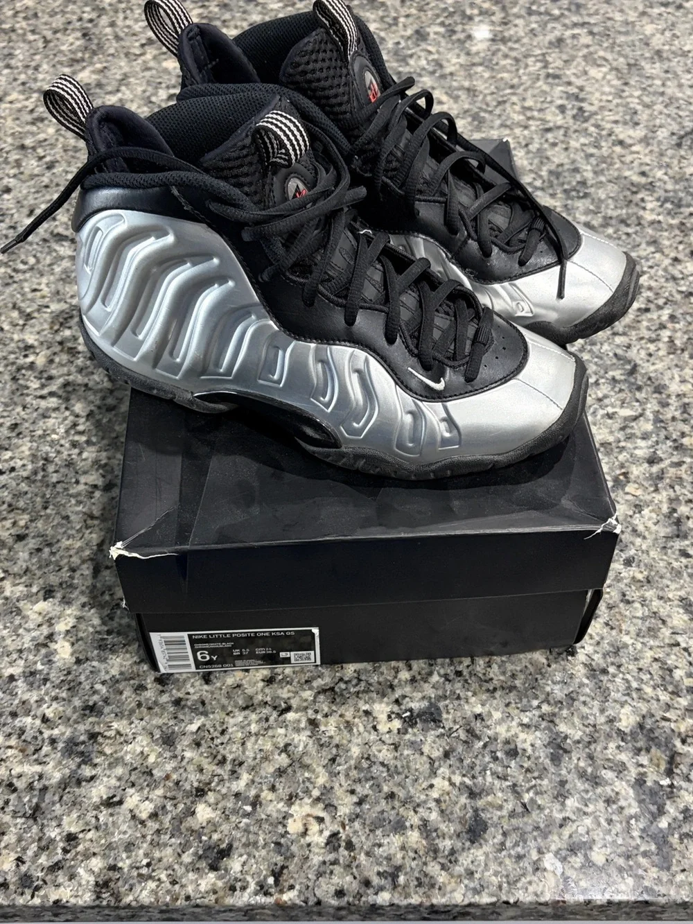 Nike Kids Silver and Black Foamposite Sneakers